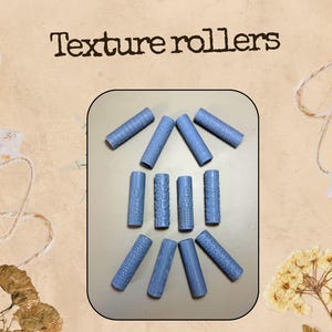 May include: A collection of light blue texture rollers, each with a unique pattern. The image includes the text "Texture rollers" and the measurement "Length: 6 cm". These rollers are designed for creating textured surfaces.
