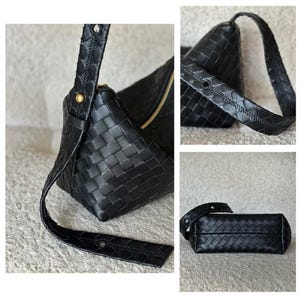 May include: Black woven leather shoulder bag with a gold zipper and strap. The bag has a unique woven pattern and a long, adjustable strap. The bag is shown from multiple angles, highlighting its design and construction.