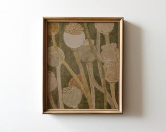 May include: A framed wall art print featuring a botanical illustration of multiple poppy seed pods on long, slender stems. The artwork uses a muted color palette of olive green, beige, and soft brown tones, encased in a thin gold-toned frame.