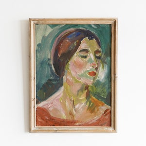 May include: A framed oil painting of a woman's portrait. The woman has dark hair and is wearing a red dress. The background is a green and blue abstract design.