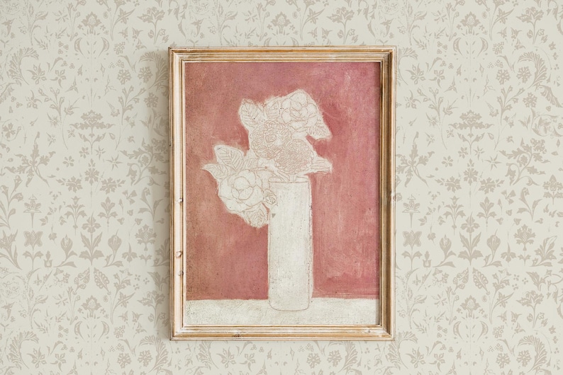 May include: A framed painting of a white flower arrangement in a white vase against a pink background.
