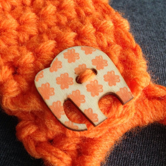 Items similar to Orange Dish Towel Topper With Wooden Elephant Button