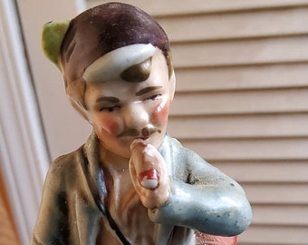 Gebruder & Heubach German porcelain figurine smoking cigar