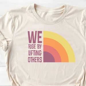 We Rise By Lifting Others T-Shirt: Feminist Empowerment Tee