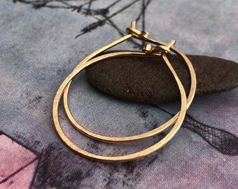 14k gold filled endless hoops hammered hoops with a matte gold patina