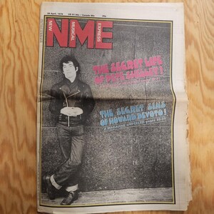 May include: A vintage issue of NME (New Musical Express) magazine from April 28, 1979. The cover features a black and white image of a man in a leather jacket. Headlines include "The Secret Life of Pete Shelley" and "The Secret Sins of Howard Devoto!"