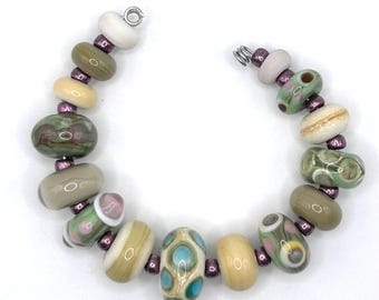 Set of artsy lampwork glass beads for jewelry making