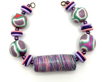 Set of five polymer clay beads handmade artisan colorful playful colors