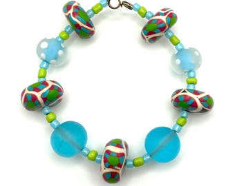 Set of bright and happy polymer clay beads handmade by the artisan