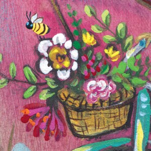 May include: A wicker basket filled with colorful flowers, including pink, white, and yellow blooms. Green leaves and a small bee are also visible. The basket is attached to a bicycle.