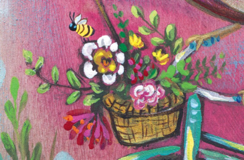 May include: A wicker basket filled with colorful flowers, including pink, white, and yellow blooms. Green leaves and a small bee are also visible. The basket is attached to a bicycle.