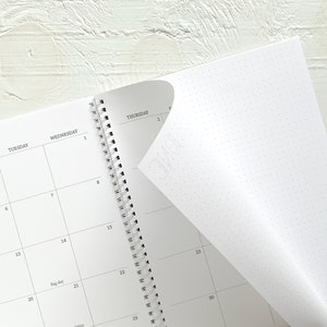 large monthly spiral planner | pages between months | start any month