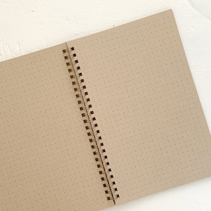 pressed travel notebook with kraft dot grid pages