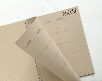 large kraft monthly spiral planner | pages between months | start any month