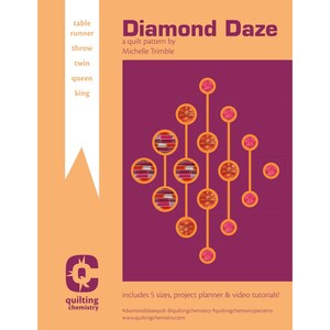 May include: A quilt pattern titled Diamond Daze by Michelle Trimble. The cover features a purple background with an orange geometric design of connected circles. Text includes table runner, throw, twin, queen, king, and Quilting Chemistry.