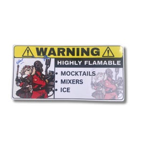 May include: A rectangular sticker with a yellow and black warning sign. The sticker features an illustration of two figures in red and black outfits with gas masks. Text on the sticker reads "WARNING HIGHLY FLAMABLE" and lists "MOCKTAILS, MIXERS, ICE."