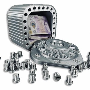 Annoying Piggy Bank Vault: 40 plus screws between you and your savings