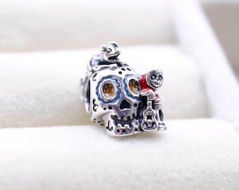 Charm de calavera de Disney Pixar Coco, Miguel y Dante que brilla en la oscuridad en plata de ley. Regalo ideal para tu pareja, ideal para collares y pulseras. Regalo para mujer y niña.