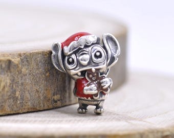 Julberlock i sterlingsilver med stygn och emalj, present till henne