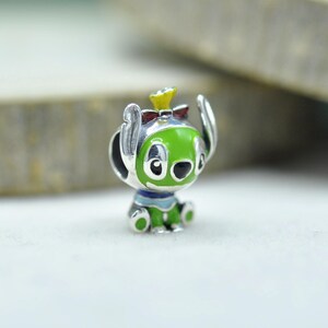 Berlock i sterlingsilver med grön söm och röd rosett: Lilo & Stitch-hänge i blå emalj bild 2