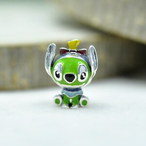 Berlock i sterlingsilver med grön söm och röd rosett: Lilo & Stitch-hänge i blå emalj bild 1
