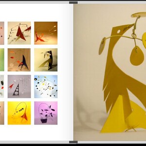 May include: A collection of mobiles and stabiles, including a yellow bird-shaped mobile with a circular base. The mobiles are made of metal and feature various shapes and colors.