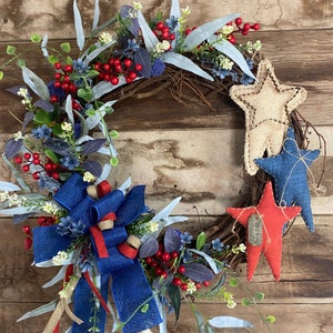 A customers finished stars on a wreath.
