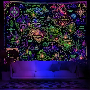 May include: A black tapestry featuring a vibrant, neon-colored fantasy map with glowing green, purple, and pink details. The map displays locations like Northlands, Crystal Peaks, Emberhold, and Veridia, with illustrations of a dragon, ships, and skulls.