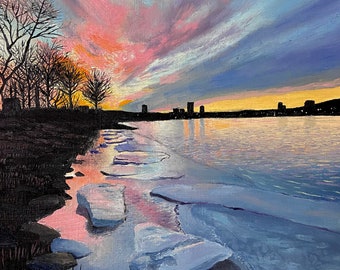 May include: A painting of a winter scene with a cityscape in the distance. The sky is a vibrant pink and purple with clouds. The foreground shows a frozen lake with ice chunks floating on the water. The reflection of the sunset is visible in the water.