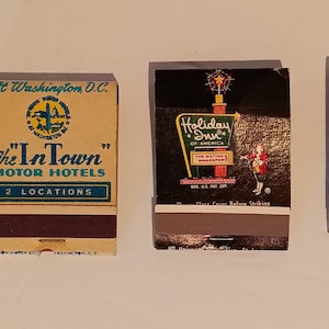 May include: Five matchbook covers, each with a different design. The first is black with a gold frame and a painting of the Madonna and Child. The second is yellow with the text "The In Town" Motor Hotels, 2 Locations. The third is red with a white star and the text "Holiday Inn." The fourth is white with a black and white image of a building and the text "Kent Manor Dupont Park Mat." The fifth is red with the text "Ramada Inn."