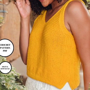 May include: A crochet pattern for a yellow sleeveless top. The pattern is available as a digital download.