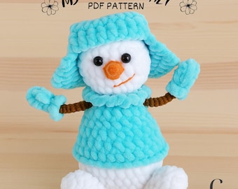 Wzór na szydełkową zabawkę amigurumi w kształcie bałwana z czapką pilota (PDF)