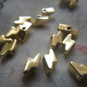 Tiny Golden Synthetic Hematite Lightning Bolt Beads 6x3mm 25 Pcs