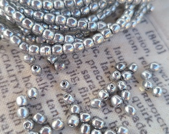 Perline Druk rotonde da 3 mm, argento brillante, 50 pezzi
