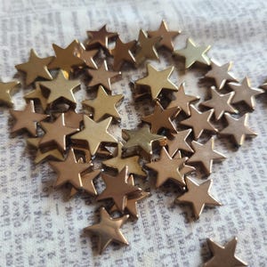 Goldene Synthetische Hämatit Sterne Perlen 10 mm 20 Stk