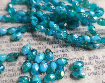 Pacific Blue and Medium Sky Blue with a Gold Wash 7x5mm Oval Glass Beads 20 Pcs