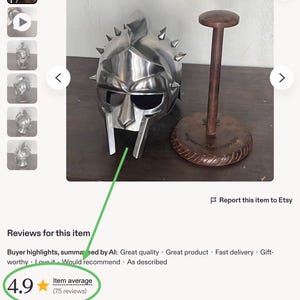 May include: A polished metal gladiator helmet with a face guard and spiked accents. The helmet is displayed next to a wooden stand with a round base. The item has an item average of 4.9 stars based on 75 reviews.
