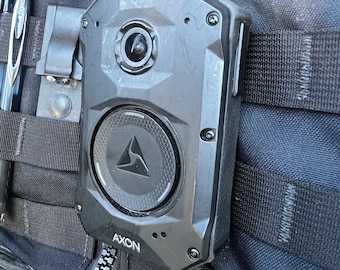 Low profile Axon body camera MOLLE mount.