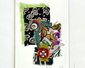 Hand made fabric, collage card or artwork, greens, navy and lavender with charms and hand stitching