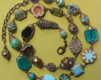 Hand knotted multi Czech Picasso glass and solid brass beaded necklace