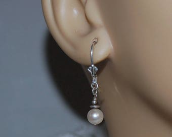 Beautiful creamy white fresh water pearls, sterling silver beads and sterling silver lever back pierced earrings