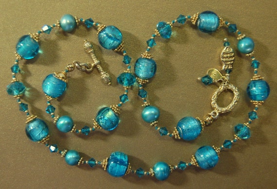 Hand knotted teal and 24k gold vermeil Bali beaded necklace