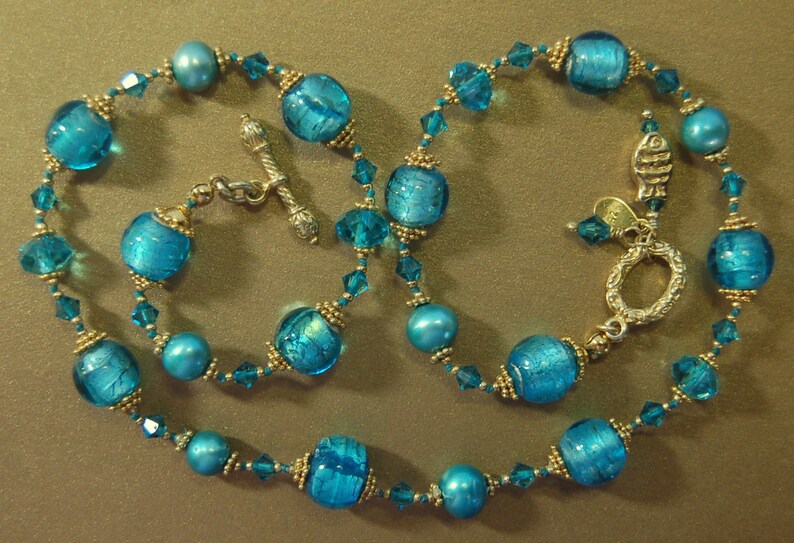 Hand knotted teal and 24k gold vermeil Bali beaded necklace