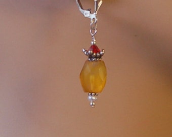 Yellow, silver, white and red pierced earrings