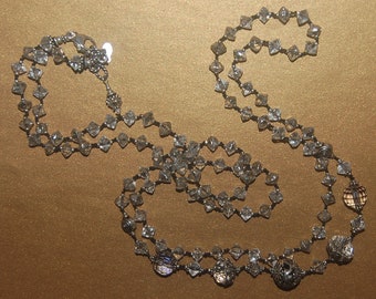 Hand knotted vintage West German clear and silver bicone beads and Bali sterling silver long necklace