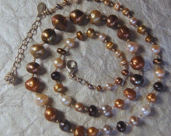 Hand knotted multi color fresh water pearls and Bali sterling silver beaded necklace