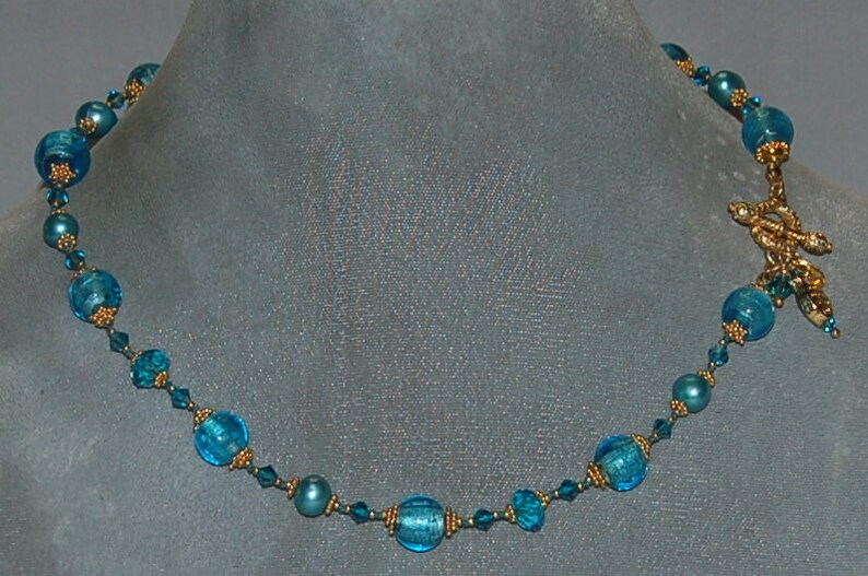 Hand knotted teal and 24k gold vermeil Bali beaded necklace