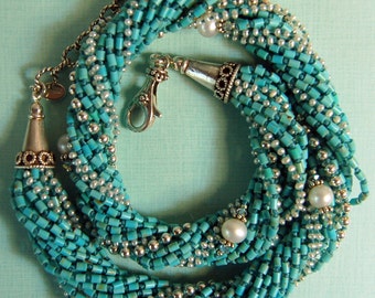 Hand knotted natural turquoise, creamy white fresh water pearls and Bali sterling silver necklace and earring set