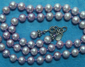 Hand knotted potato shaped light purple fresh water pearls and Bali sterling silver beaded necklace