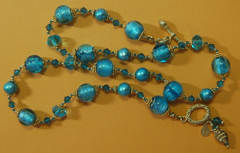 Hand knotted teal and 24k gold vermeil Bali beaded necklace